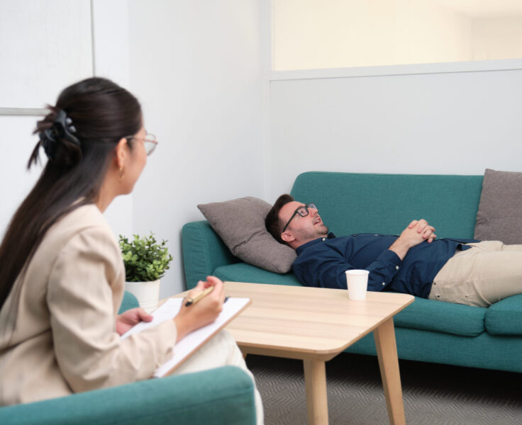Therapist supporting client during trauma and PTSD therapy session in Scottsdale AZ