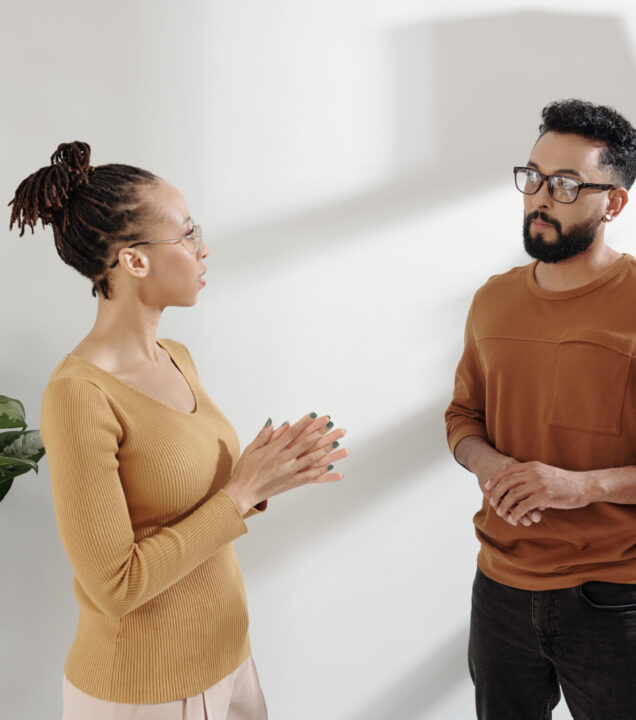 two people engaged in respectful conversation, representing interpersonal effectiveness skills taught in DBT therapy at Pathways counseling services in Scottsdale az