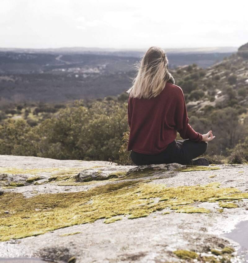 Woman practicing mindfulness meditation outdoors during mindfulness therapy in Scottsdale AZ