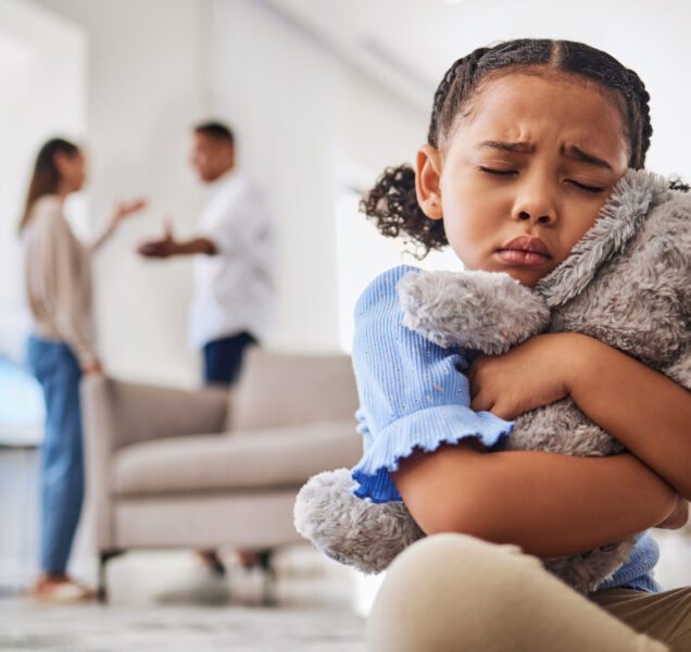 Child experiencing anxiety and seeking comfort during therapy in Scottsdale AZ at Pathways Counseling Services