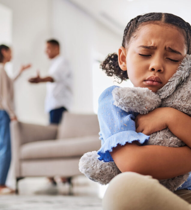 Child experiencing anxiety and seeking comfort during therapy in Scottsdale AZ at Pathways Counseling Services
