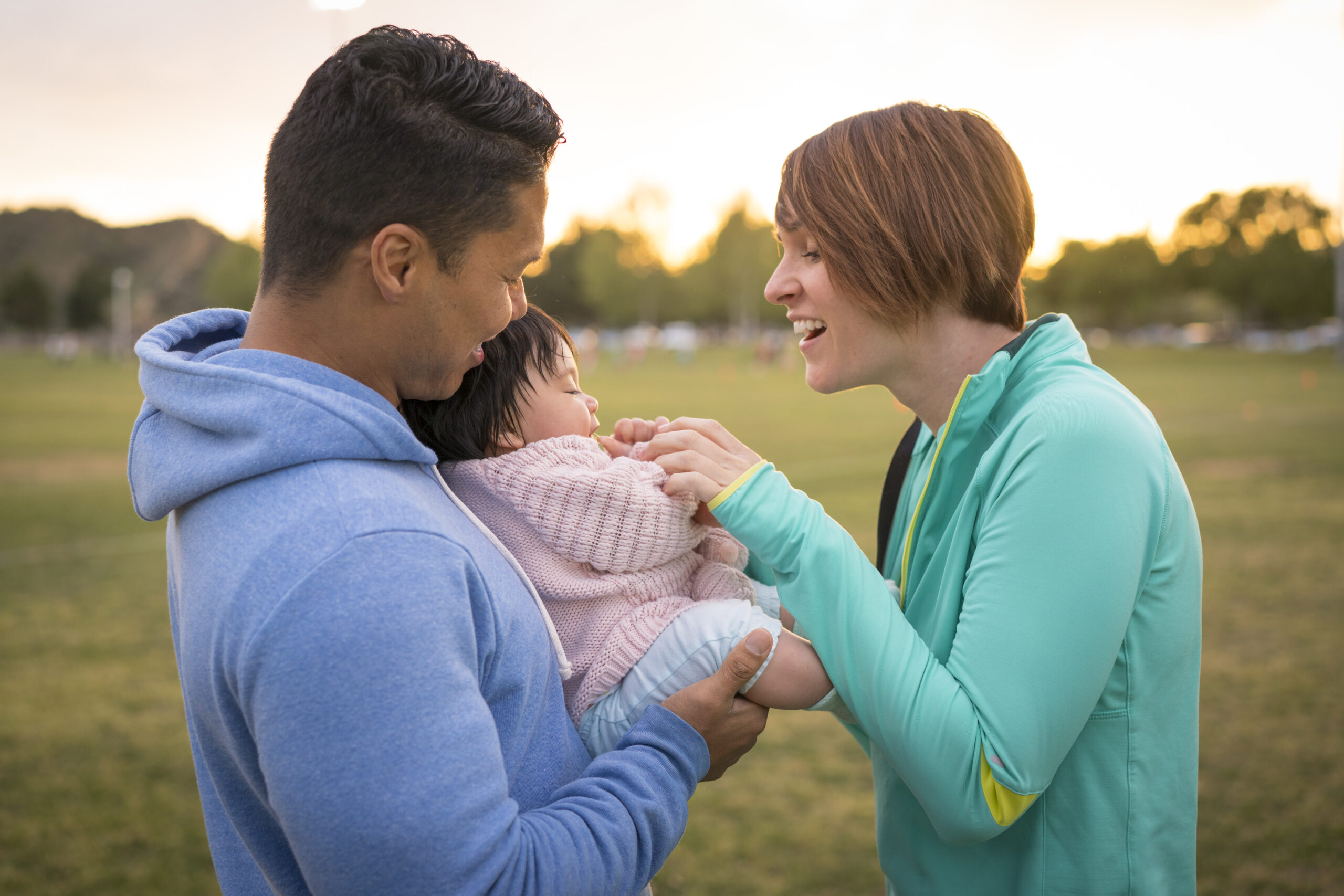 parents interacting with baby in Scottsdale AZ demonstrating proactive parenting and healthy family bonding at Pathways Counseling Services