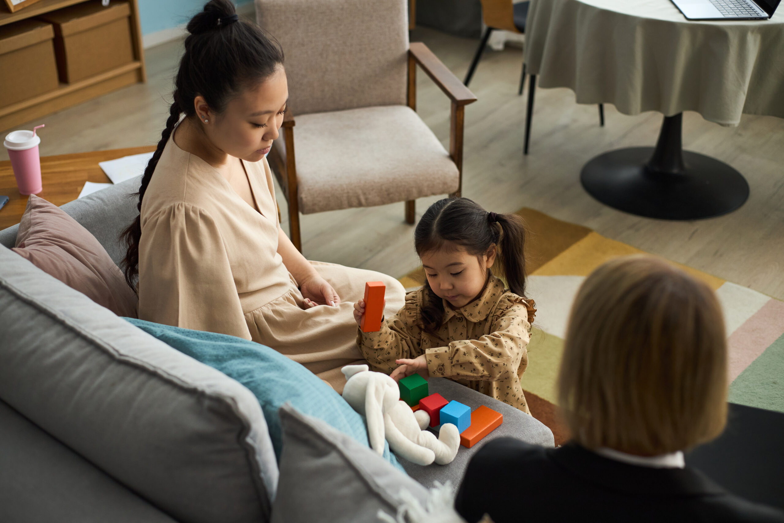 child therapist in Scottsdale AZ working with children during therapy session at Pathways Counseling Services