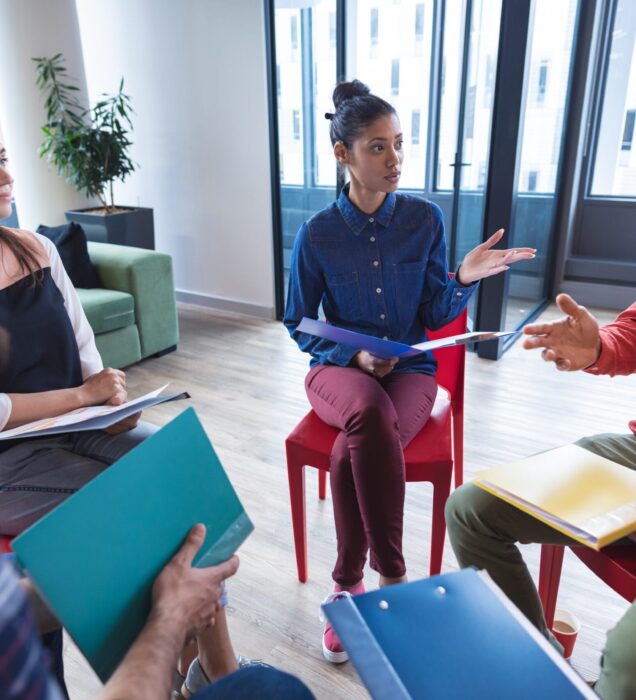 Group Therapy in Scottsdale AZ | Pathways Counseling Services group therapy session in Scottsdale AZ with therapist guiding group discussion at Pathways Counseling Services