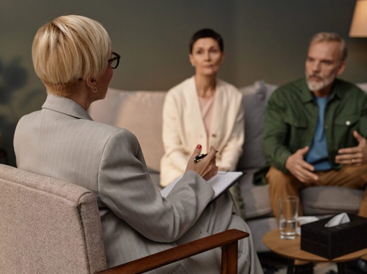 marriage counselor in Scottsdale AZ working with couple during therapy session at Pathways Counseling Services