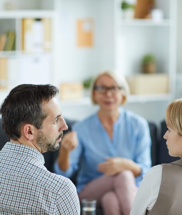 family therapist in Scottsdale AZ working with parents during counseling session at Pathways Counseling Services