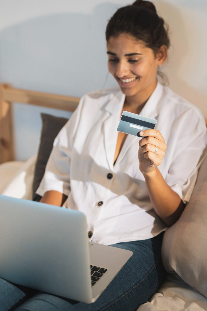 woman holding credit card