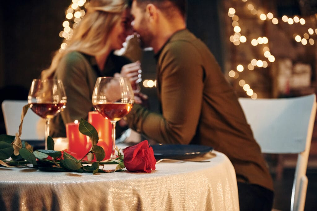 Couple enjoying a romantic dinner in Scottsdale to enhance their connection